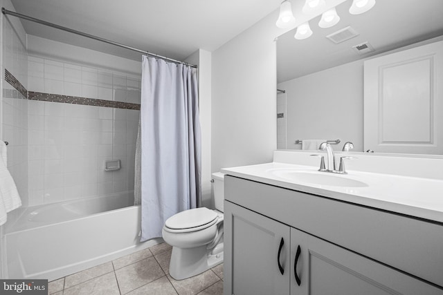 full bathroom featuring visible vents, vanity, toilet, and tile patterned floors