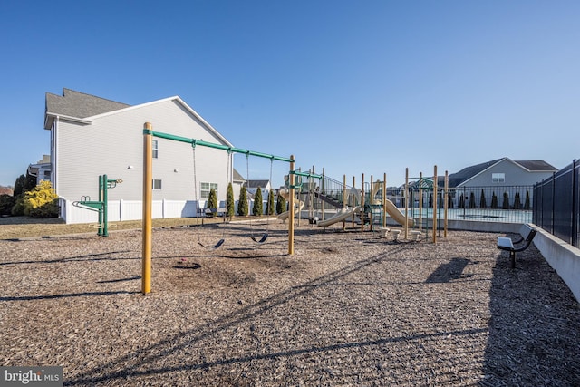 community jungle gym with fence