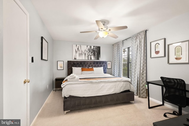 bedroom featuring carpet floors, ceiling fan, and baseboards