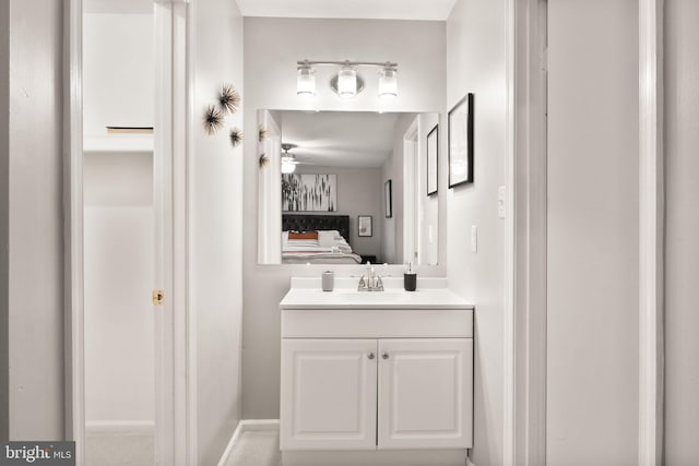 bathroom featuring vanity and ensuite bathroom