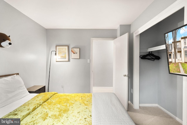 unfurnished bedroom featuring carpet flooring, baseboards, and multiple windows