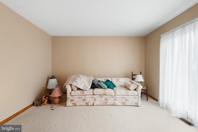 interior space featuring carpet flooring, visible vents, and baseboards