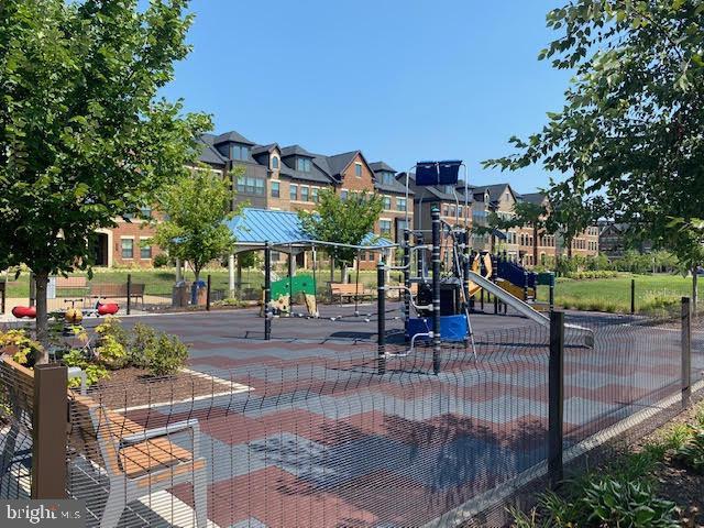 community play area with a residential view