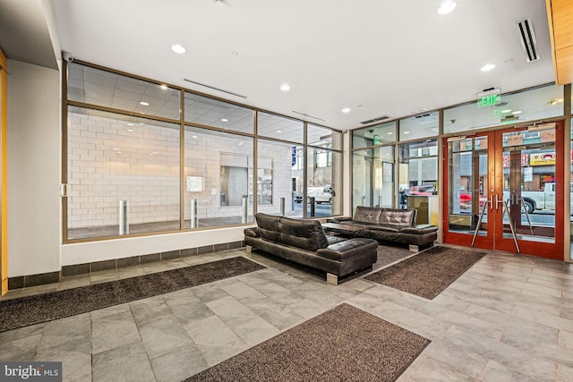 building lobby featuring visible vents