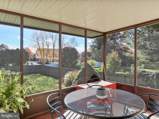 sunroom / solarium featuring plenty of natural light