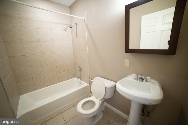 full bathroom featuring baseboards, shower / tub combination, toilet, and tile patterned floors