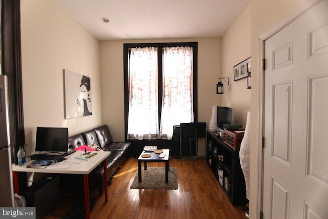 living area featuring hardwood / wood-style flooring