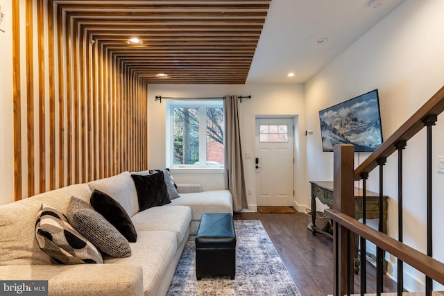 living area with baseboards, stairway, dark wood finished floors, and recessed lighting