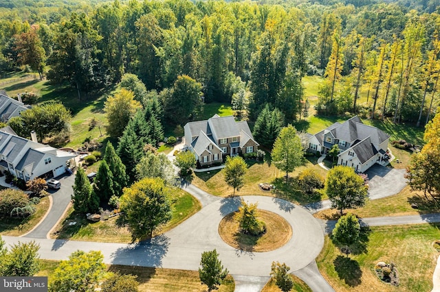 drone / aerial view with a forest view