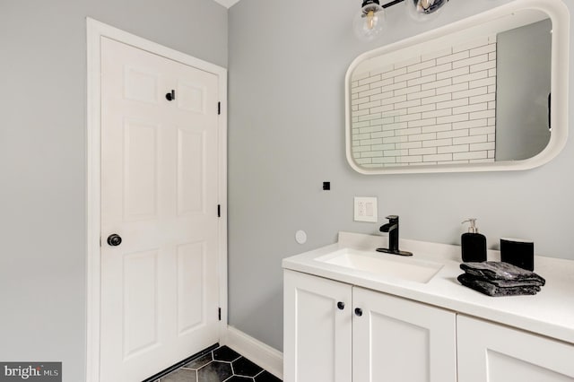 bathroom with vanity and tile patterned floors