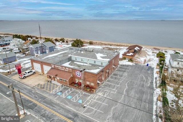 bird's eye view with a residential view and a water view