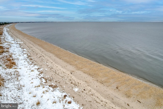 view of water feature with a beach view