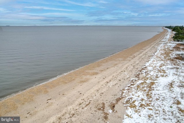 property view of water featuring a beach view