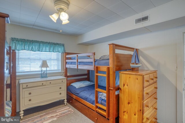 bedroom featuring visible vents and carpet floors