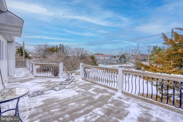 view of snow covered patio