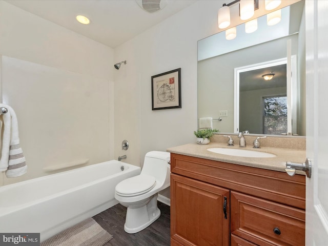 full bath featuring vanity, toilet, and shower / bathtub combination