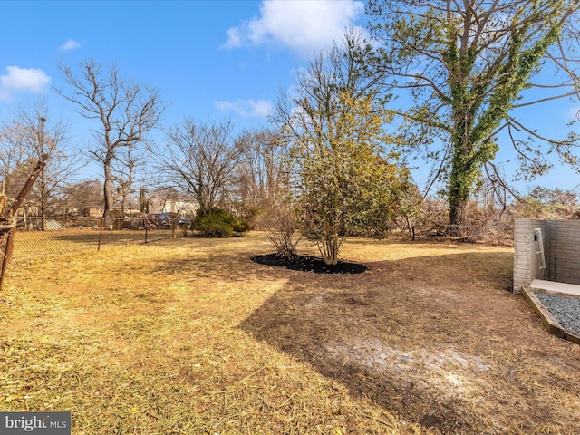 view of yard with fence