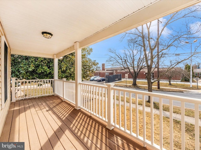 wooden deck featuring a porch