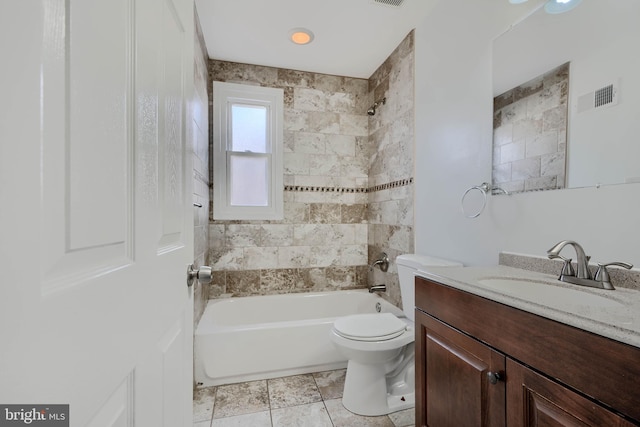 bathroom with vanity,  shower combination, toilet, and visible vents