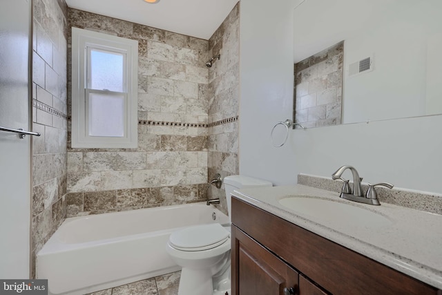 full bathroom with bathtub / shower combination, toilet, vanity, and visible vents