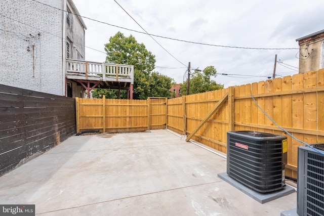 view of patio / terrace featuring a fenced backyard and central AC