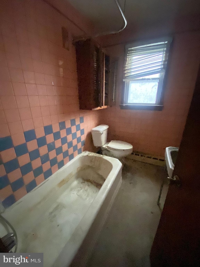 full bath featuring toilet, a baseboard heating unit, a washtub, and a shower