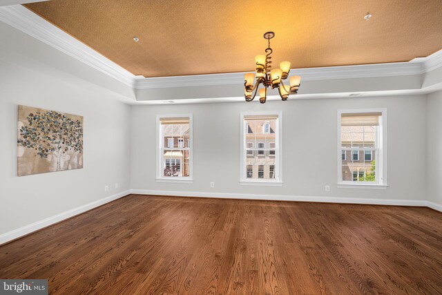 4637 Kirkland Pl, Alexandria, VA 22311 - spare room featuring ornamental molding, a chandelier, dark wood-style floors, baseboards, and a tray ceiling
