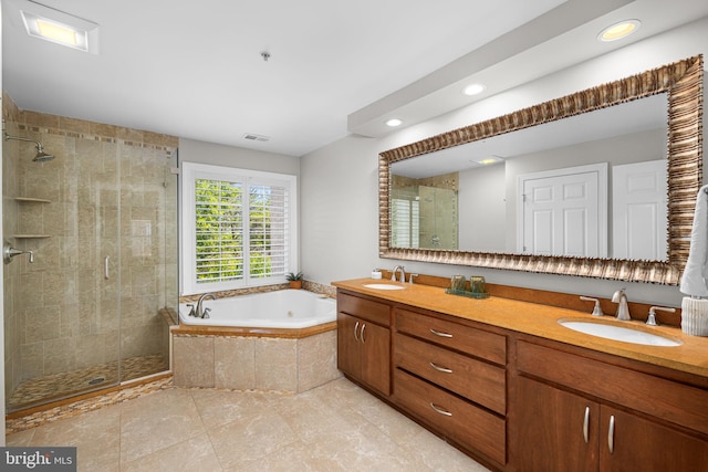 4637 Kirkland Pl, Alexandria, VA 22311 - bathroom with a bath, a stall shower, double vanity, recessed lighting, and tile patterned flooring