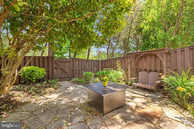 4637 Kirkland Pl, Alexandria, VA 22311 - fenced backyard with a gate and a patio area