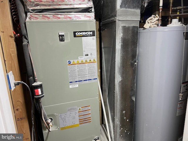 utilities featuring water heater and heating unit