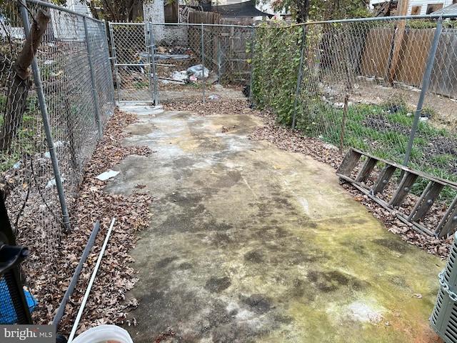 view of yard featuring a patio area and a fenced backyard