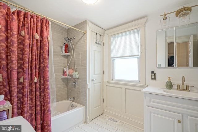 full bathroom with vanity, visible vents, and shower / bath combo