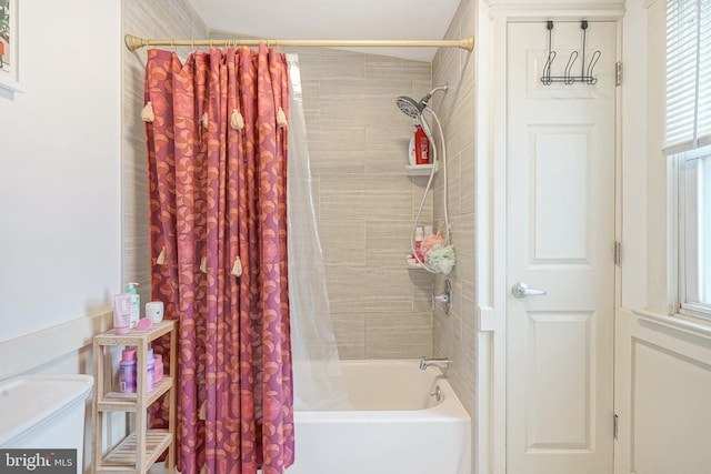 bathroom with shower / bath combo