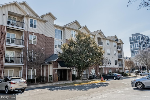 view of property with uncovered parking