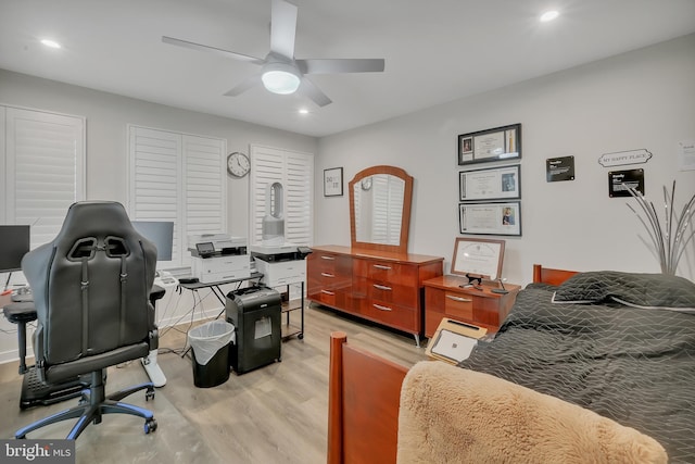 office space featuring ceiling fan, light wood-type flooring, and recessed lighting