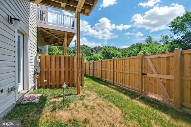 view of yard with a gate and fence