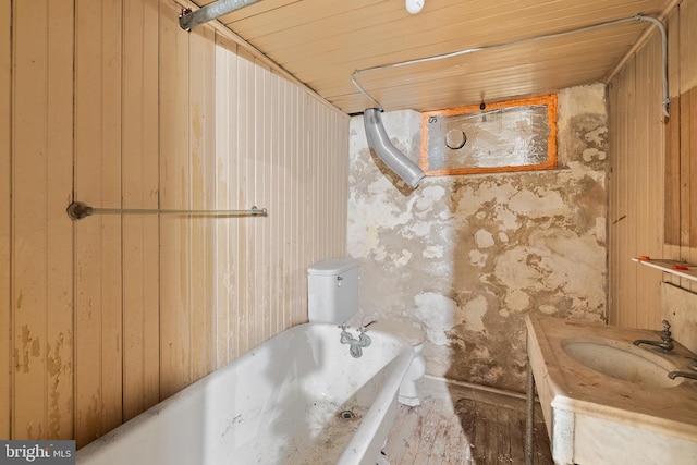 bathroom with toilet, a bathing tub, a sink, wood ceiling, and walk in shower