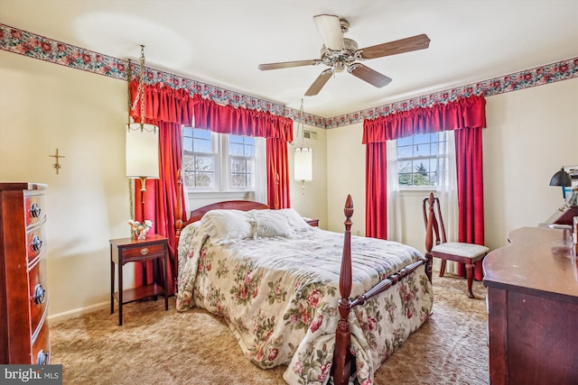 bedroom with baseboards, carpet, and ceiling fan