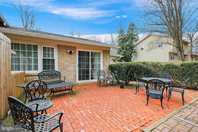 view of patio featuring outdoor dining area