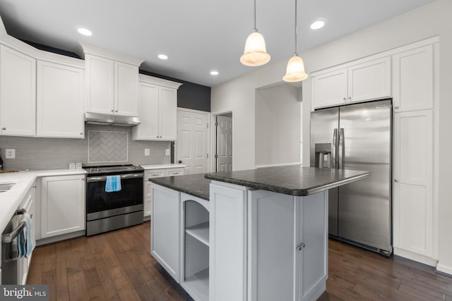 kitchen featuring under cabinet range hood, stainless steel appliances, dark wood-type flooring, white cabinetry, and open shelves