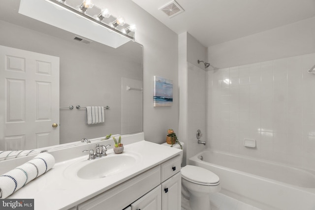 full bath with shower / washtub combination, visible vents, vanity, and toilet