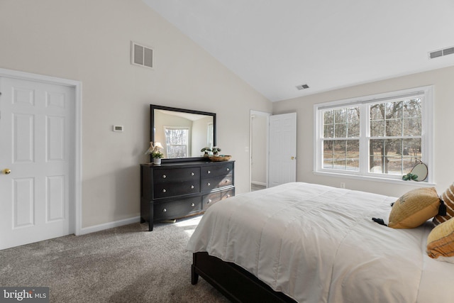 carpeted bedroom with high vaulted ceiling, visible vents, and baseboards