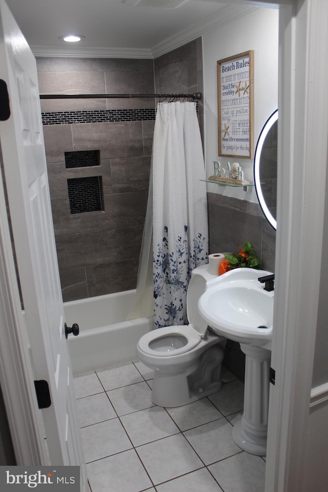 bathroom featuring toilet, ornamental molding, shower / bath combo, and tile patterned flooring