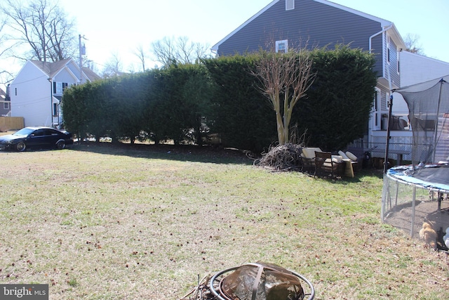 view of yard with a trampoline