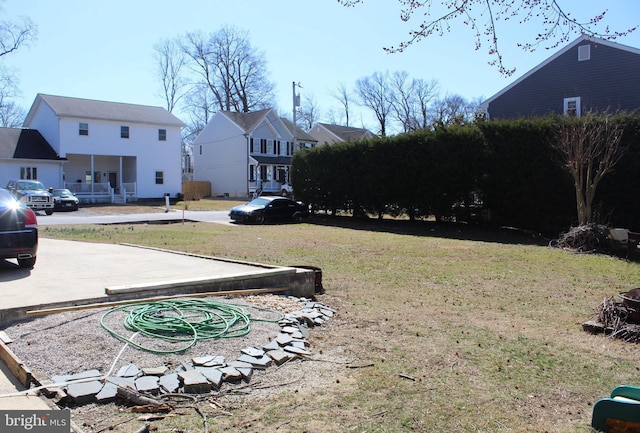 view of yard with a residential view