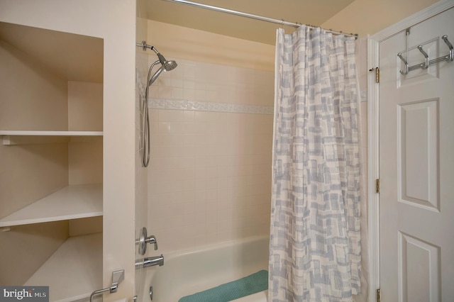 full bathroom featuring shower / tub combo with curtain