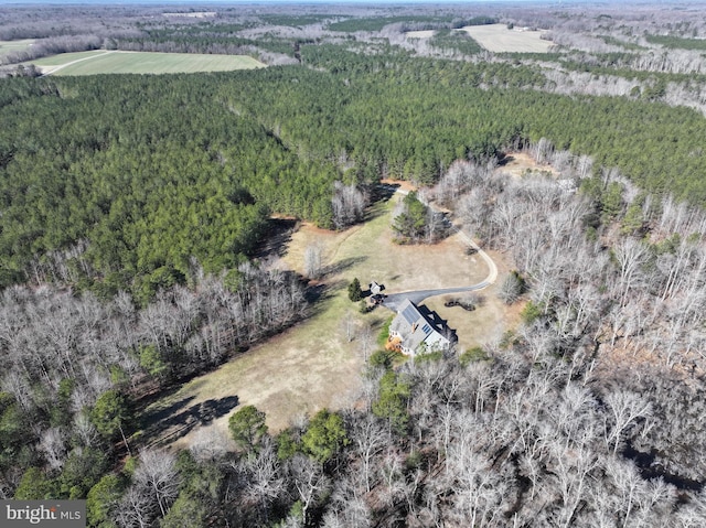 birds eye view of property with a rural view