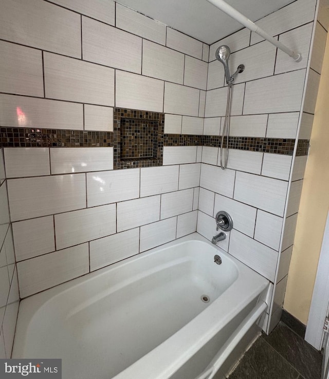 bathroom with shower / tub combination