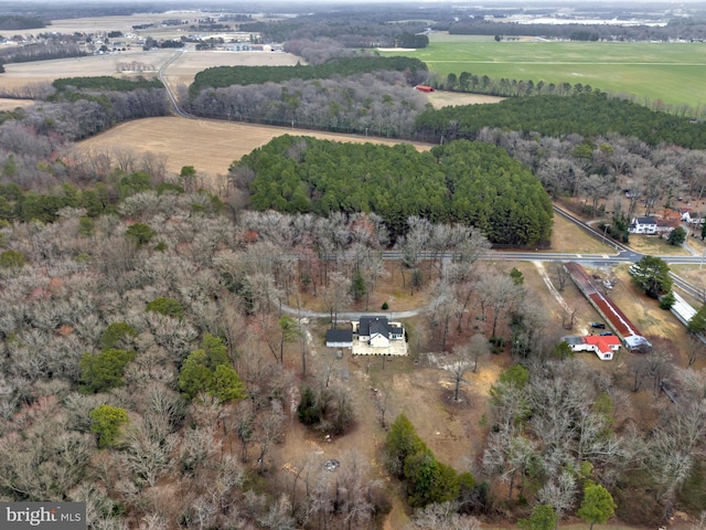 birds eye view of property featuring a rural view