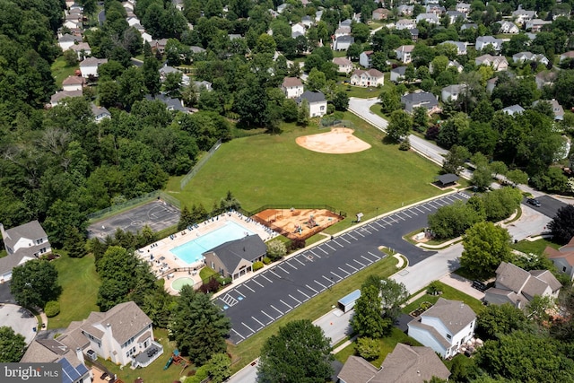 birds eye view of property with a residential view